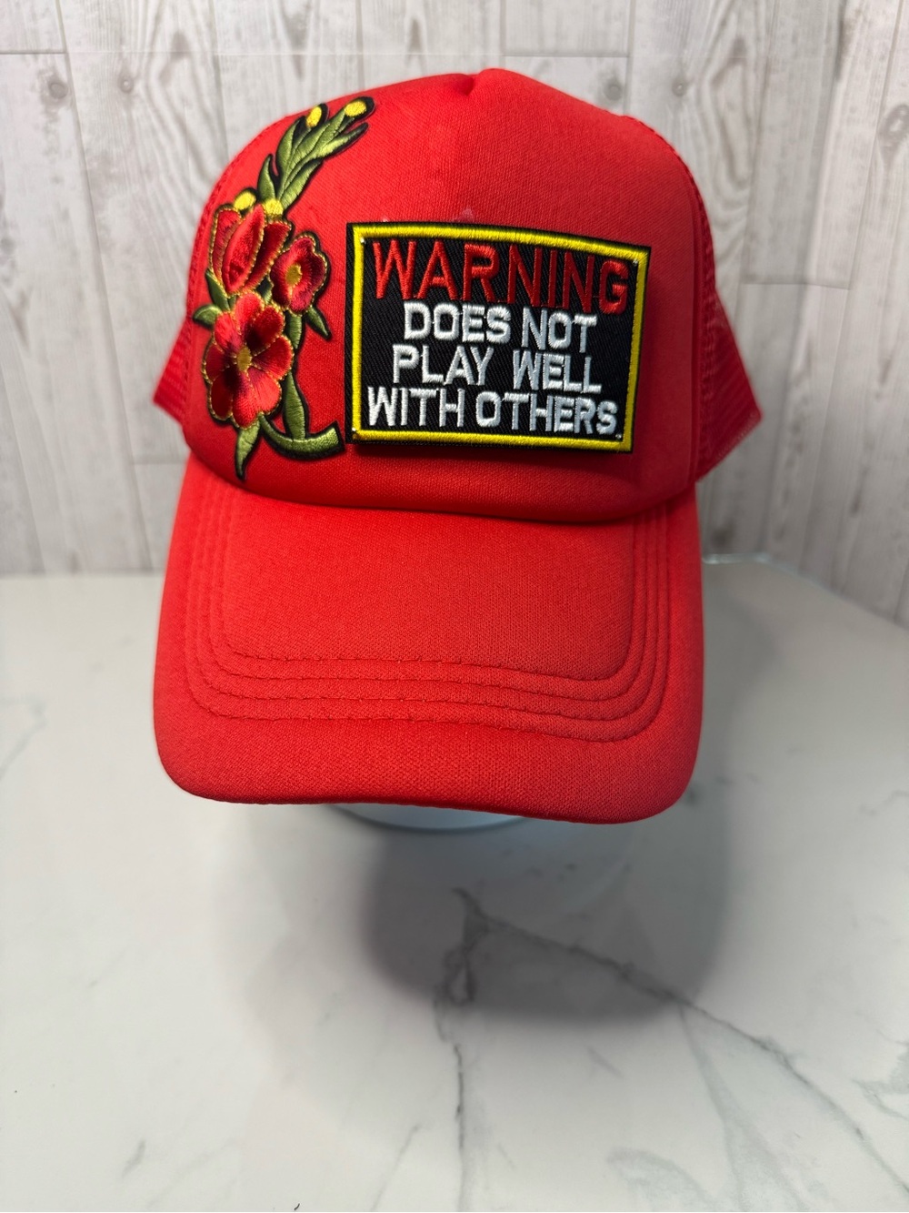 Bold Red Women's Trucker Hat with Floral Patch and 'Warning' Patch